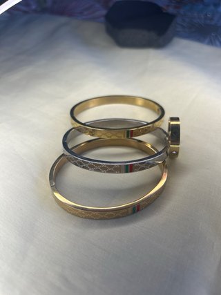 Conjunto Pulseras y anillo Gucci Oro y Plata
