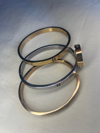 Conjunto Pulseras y anillo Gucci Oro y Plata