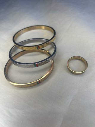 Conjunto Pulseras y anillo Gucci Oro y Plata
