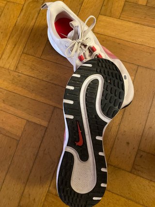 Zapatillas Nike running rosas y blancas