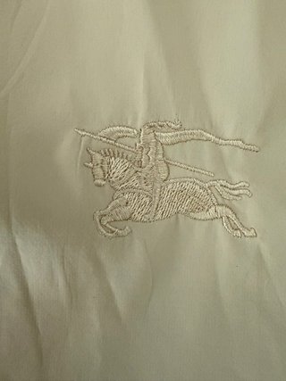 Gabardina Burberry niña beige