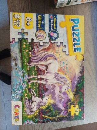 Dos puzzles: Stitch y Unicornio