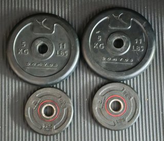 4 Discos Pesas Decathlon 5kg y 1.25kg