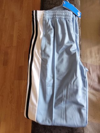 Pantalón Adidas azul y blanco