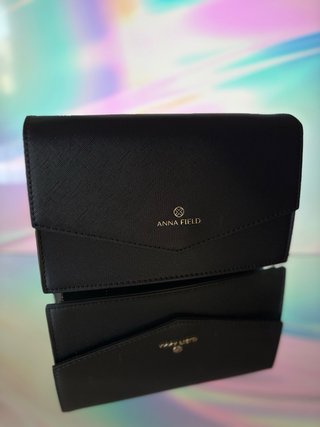Bolso de mano Anna Field negro y dorado