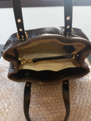 Bolso de mano Bimba y Lola marrón y dorado