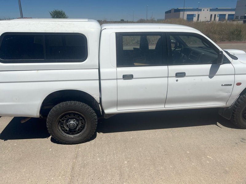 Mitsubishi L 200 1999 - foto 1