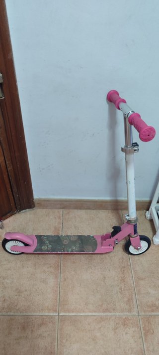 Patinete rosa plegable y ajustable