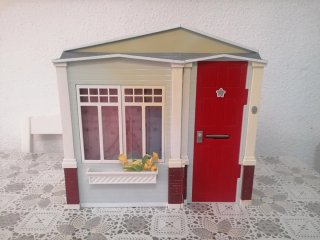 Casita de muñecas con accesorios