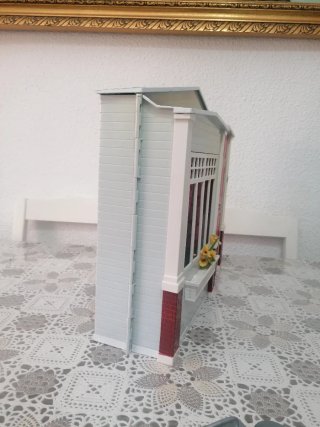 Casita de muñecas con accesorios