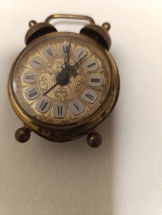 Reloj despertador antiguo dorado