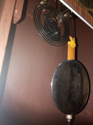 Reloj de pared antiguo de péndulo