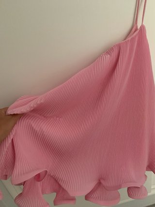 Blusa rosa plisada con volantes