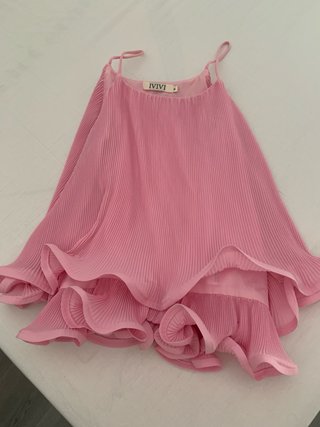 Blusa rosa plisada con volantes