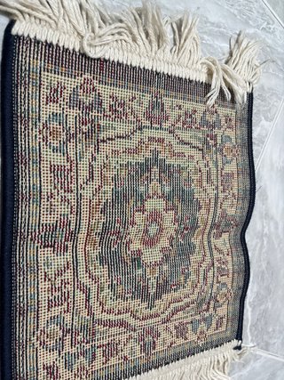 Tappeto decorativo con frange