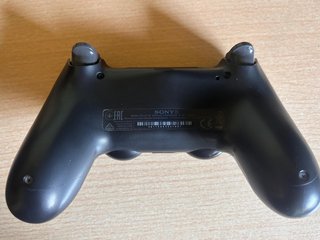 PS4 Slim de 1TB con mando original