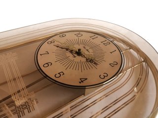 Reloj vintage de péndulo de cristal y metal 80's