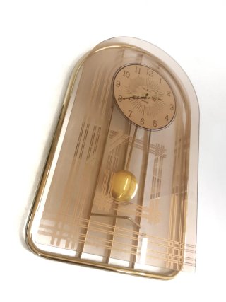 Reloj vintage de péndulo de cristal y metal 80's