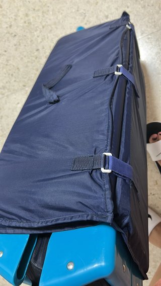 Cuna de viaje y alzador de silla portátil