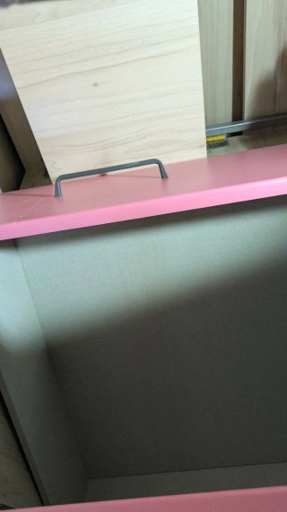 Cama de madera con cajones