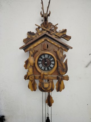 Reloj de cuco antiguo de madera