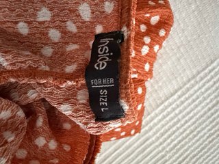 Mono naranja estampado puntos con cinturón