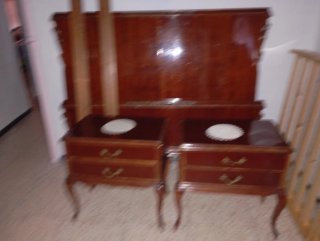 Cabecero de cama de madera oscura