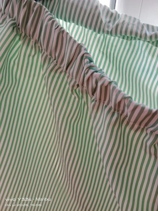 Pantalón corto blanco y verde