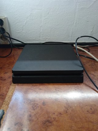 PS4 Slim + Juegos con progreso y cable hdmi