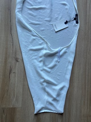 Mangas - torera de gasa blanco con etiqueta