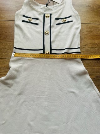 Mini abito bianco con bottoni oro