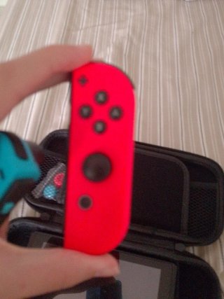Nintendo Switch Azul y Rojo con Funda