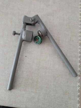 Arreglador de chapas, tapones corona