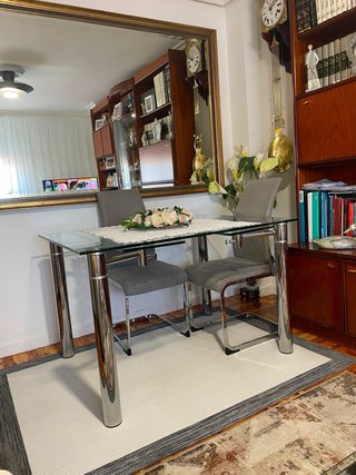 Mesa de comedor cristal extensible.
