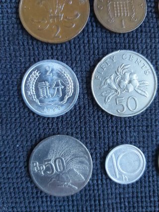 Lote 9 monedas antiguas de varios países
