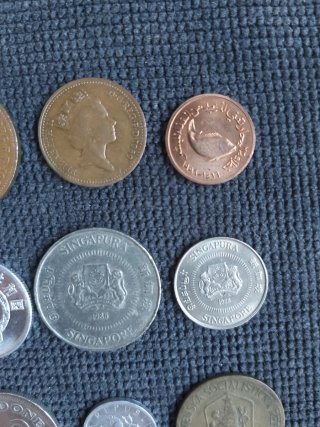 Lote 9 monedas antiguas de varios países