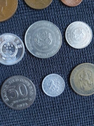 Lote 9 monedas antiguas de varios países