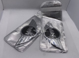 2X LOGO NUEVO MINI CAPO MALETERO EMBELLECEDOR