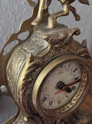 Reloj de mesa de bronce