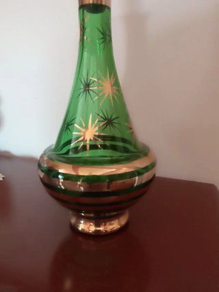 Bottiglia vintage vetro verde oro