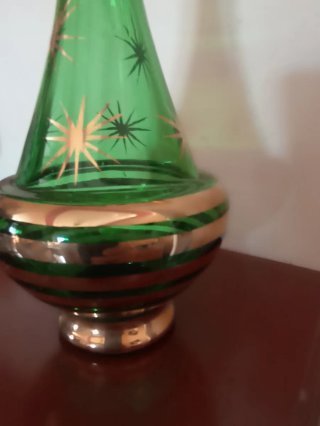 Bottiglia vintage vetro verde oro