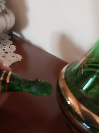 Bottiglia vintage vetro verde oro