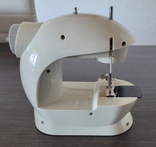 Máquina de coser Genius con accesorios