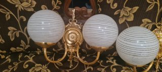 Juego de 2 Apliques de luz de metal  y cristal.