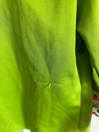 Chaqueta verde corta con volantes