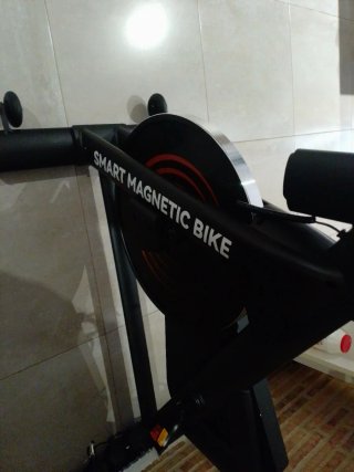 Bicicleta Estática Negra y Naranja
