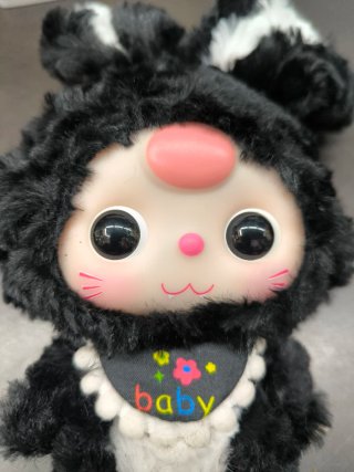 Muñeco Baby Three Peluche Negro