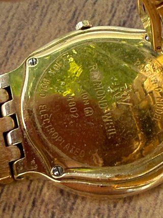 Reloj Raymond Weil Oro Negro Caballero