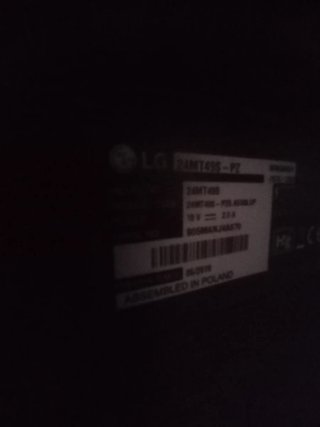 Smart TV LG Negra con soporte para pared