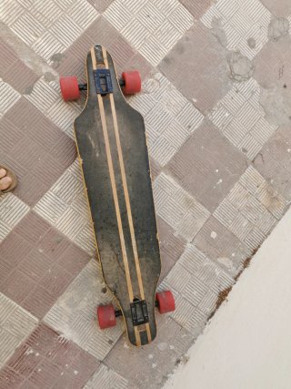 Longboard con diseño de ojo psicodélico